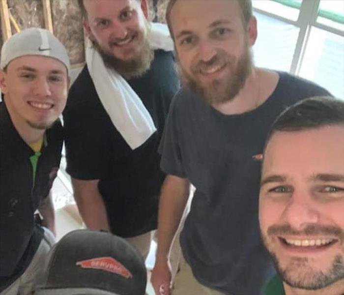 Multiple SERVPRO of North Pensacola Team Members and Managers working together