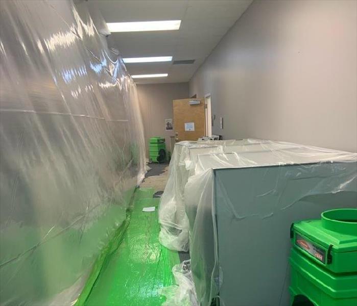 Commercial Hallway with Plastic Sheeting for Protection